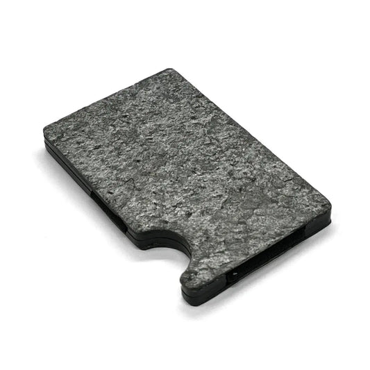 Sleek slate stone card holder with RFID blocking, minimalist design, and eco-friendly packaging. Holds up to 12 cards, available with or without money clip. European brand Seif Design.