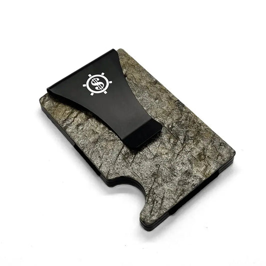 A sleek Card Holder with RFID Blocking on natural slate stone, embodying minimalist design and eco-friendly packaging by Seif Design.