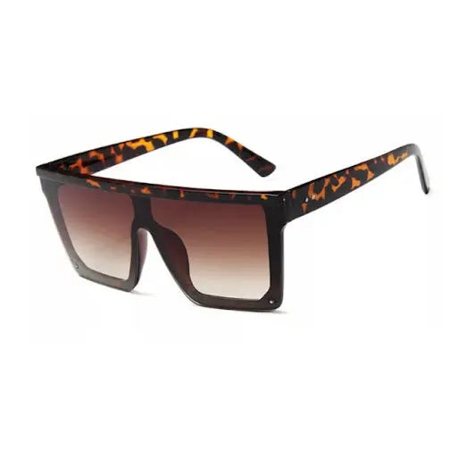 Close-up of DUBAI Leopard sunglasses with tortoise frame and leopard print lenses. Polarized UV-400 protection, durable design for outdoor comfort. Includes carrying case.