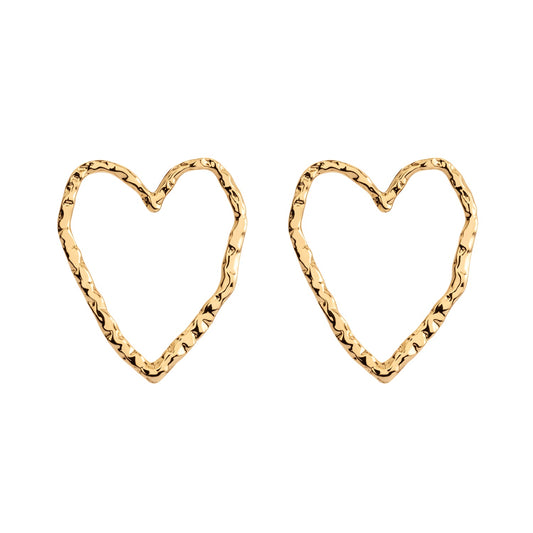 Gold heart-shaped Eros stud earrings by ONEHE. Minimalistic, sustainable design made from recycled silver, 18k gold plated. Hypoallergenic and easy to wear. Ideal for everyday elegance.