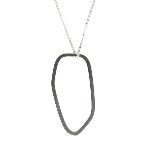 Handcrafted Frames Silver Necklace by Lisa Kroeber Jewellery, featuring a unique oval pendant on a sterling silver chain. Reflects artisanal quality and European design excellence.