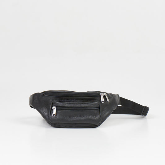 A Leather Waist Bag with zippers on a white surface, showcasing a black pack with adjustable strap. Crafted in Europe from natural leather, featuring multiple compartments. Dimensions: 30 x 13 x 10 cm.