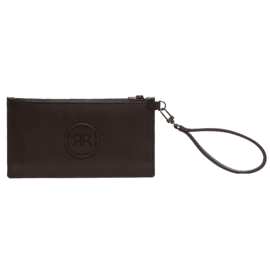 A black leather wallet with a removable wristlet, featuring a logo detail. Crafted from high-quality real leather with a YKK zipper and three compartments for cards and cash. Dimensions: H: 10cm, W: 19cm, D: 2cm.