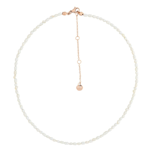 A close-up of a necklace with freshwater pearls and a gold chain, showcasing delicate pearls and durable stainless steel craftsmanship. Perfect for versatile styling and gifting. Length: 38 cm + 5 cm extension.