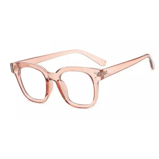 Close-up of MADRID Blue Light Glasses with pink frames and clear lenses, designed to protect eyes from blue and UV light. Ideal for screen time, work, or relaxation. Europe-designed with zero-power lenses.