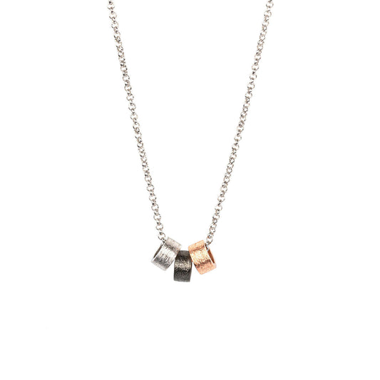 Airy Dots Choker Necklace featuring three round elements on a silver chain, designed by MyaMoon, with rhodium and rose gold plating for durability.