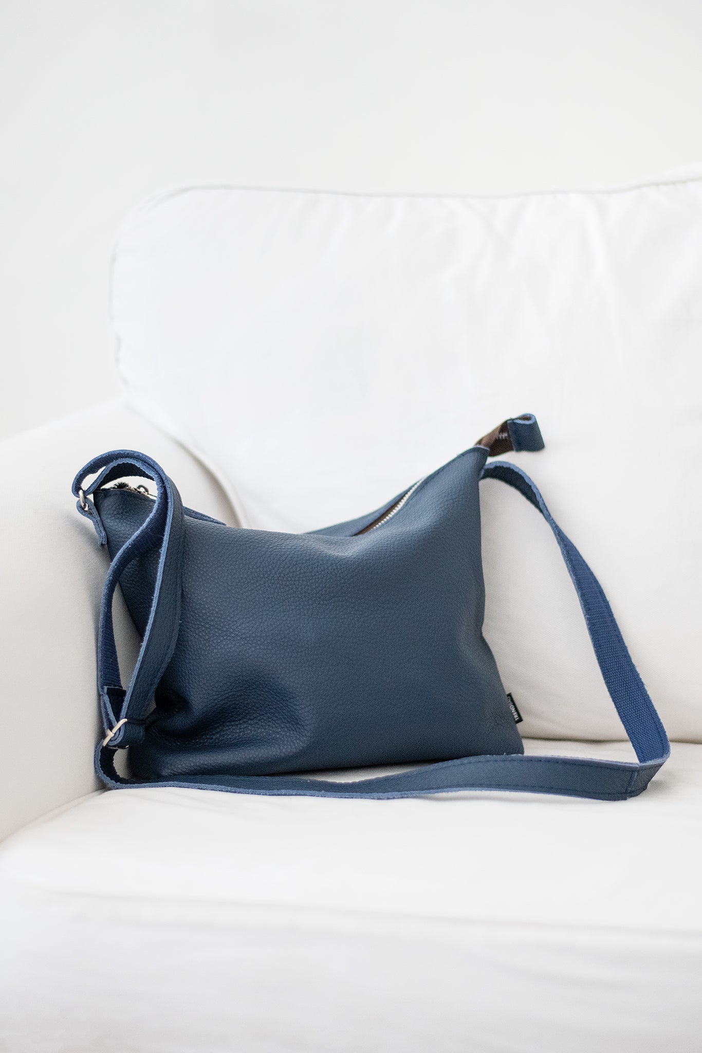 Handmade Anet L shoulder bag crafted from high-quality leather leftovers, uniquely designed in Estonia by Trendbag. Eco-friendly and durable.