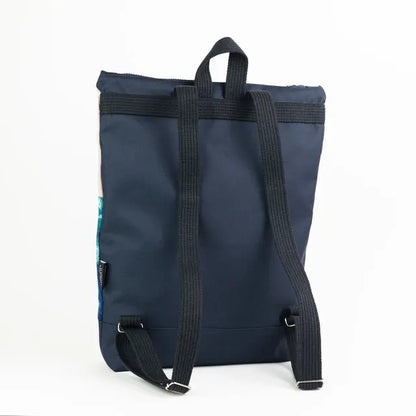 Black backpack with Blue Mountains design, velvet top, navy blue bottom, and adjustable straps. Features zipper closure, laptop pocket, and stylish print. Dimensions: 44cm x 36cm.