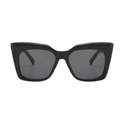 Close-up of MODERN black sunglasses with grey lenses. Polarized UV-400 protection, high-quality frames for style and durability. Includes carrying case. Designed in Europe for confident outdoor wear.