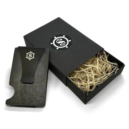 Slate stone cardholder with RFID blocking, featuring a black box with a dollar sign clip. Holds up to 12 cards, eco-friendly packaging. By Seif Design.