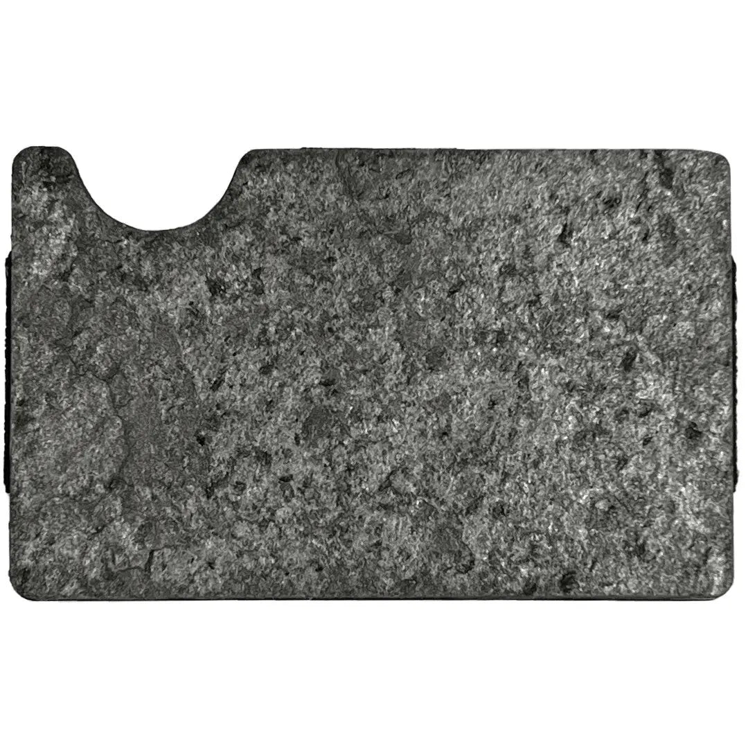 Slate stone cardholder with RFID blocking technology, minimalist design, and eco-friendly packaging. Holds up to 12 cards, dimensions 9 x 5.5 x 1.5 cm.