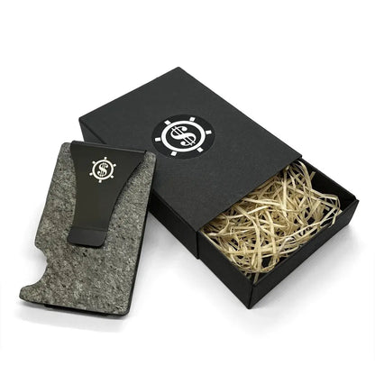 Minimalist slate stone cardholder with RFID blocking, featuring a dark birch design. Holds up to 12 cards, eco-friendly packaging, and available with a money clip option.