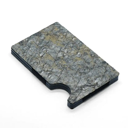 Slate stone card holder with RFID blocking, minimalist design, and eco-friendly packaging. Holds up to 12 cards, with a black handle. Available in Gloomy Desert theme.