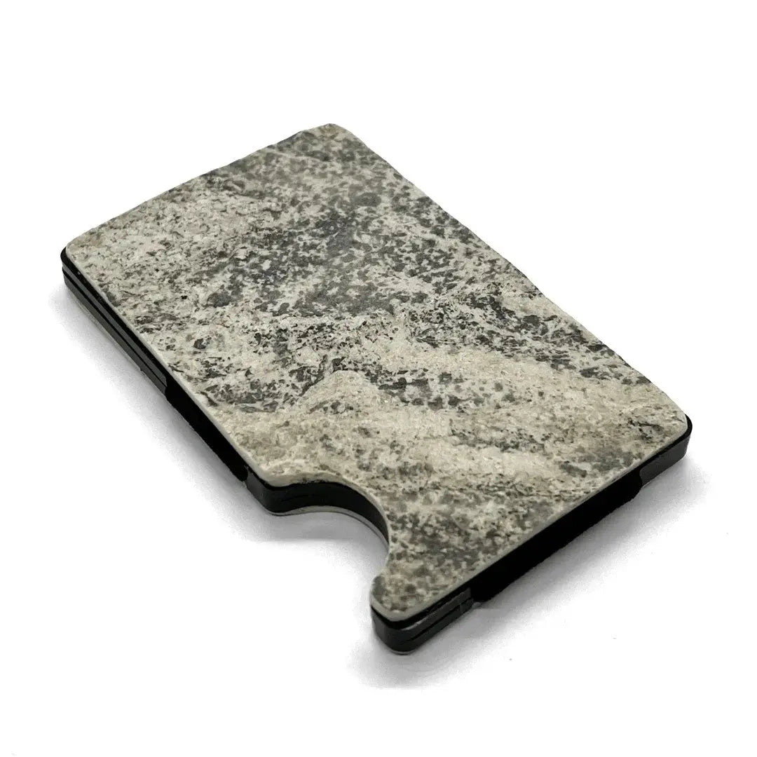 A sleek card holder with RFID blocking, crafted from natural marble. Holds up to 12 cards, featuring an eco-friendly design and available with or without a money clip.