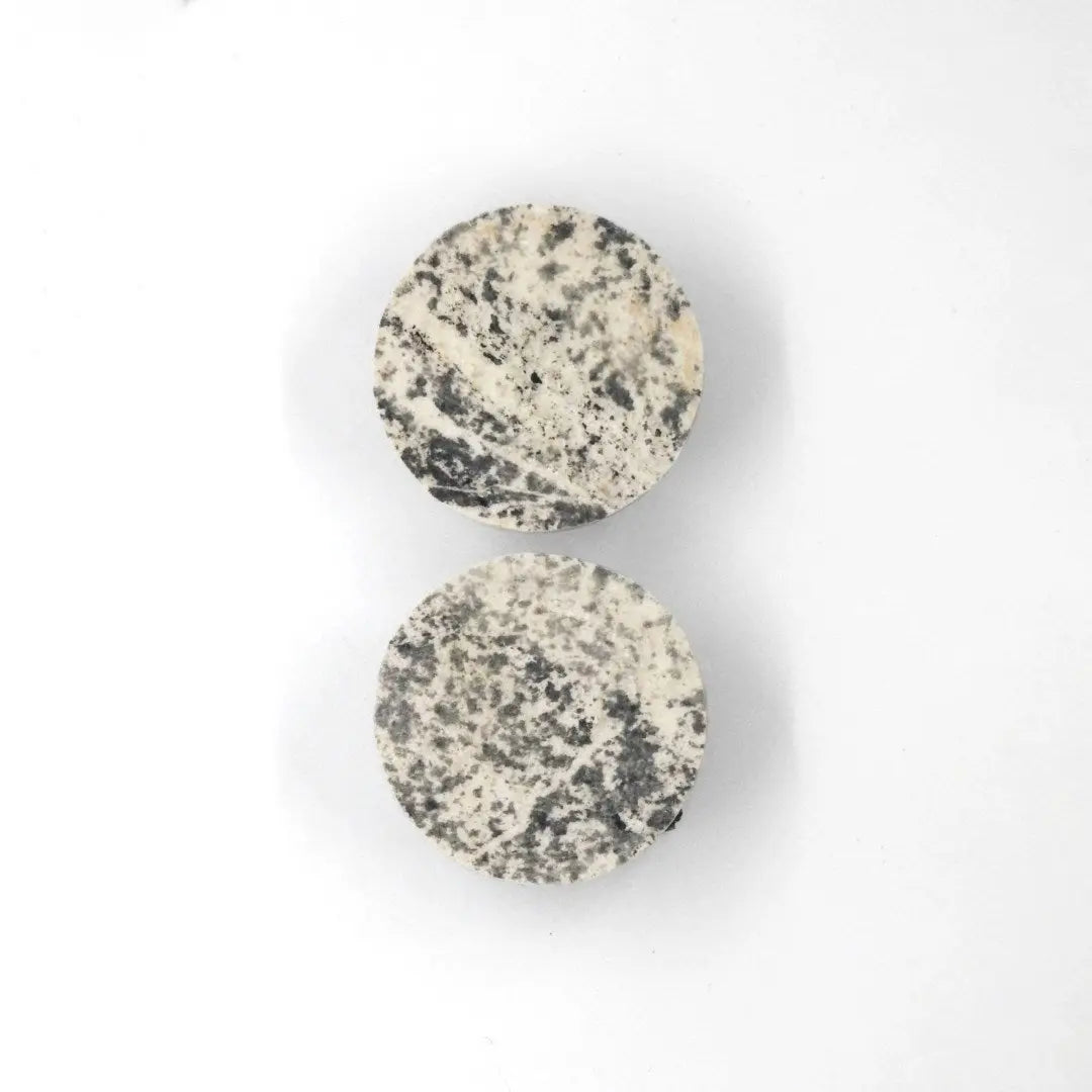 Minimalist Marine Marble earrings crafted from slate and marble, inspired by nature. Created by Seif Design, known for unique stone-designed pieces.