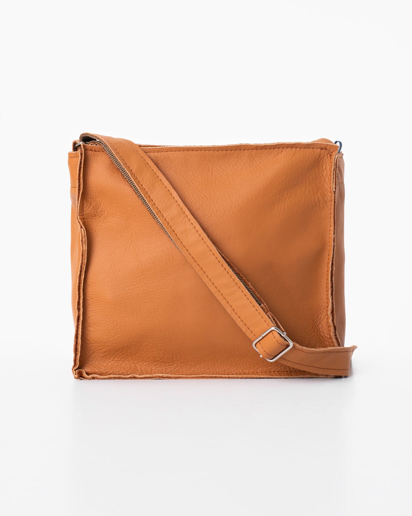 Handmade leather Folk 1 shoulder bag - Calvados from Trendbag, Estonia. Crafted from high-quality furniture industry leftovers, each bag is unique. Durable and eco-friendly.