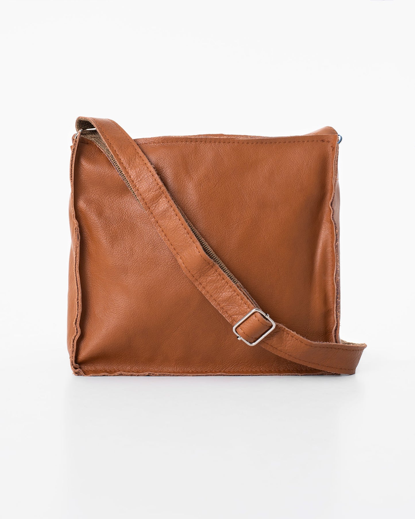 Handmade Folk 1 shoulder bag - Peanut from Trendbag, crafted from high-quality leather leftovers, each unique due to furniture industry materials. Designed and made in Estonia.