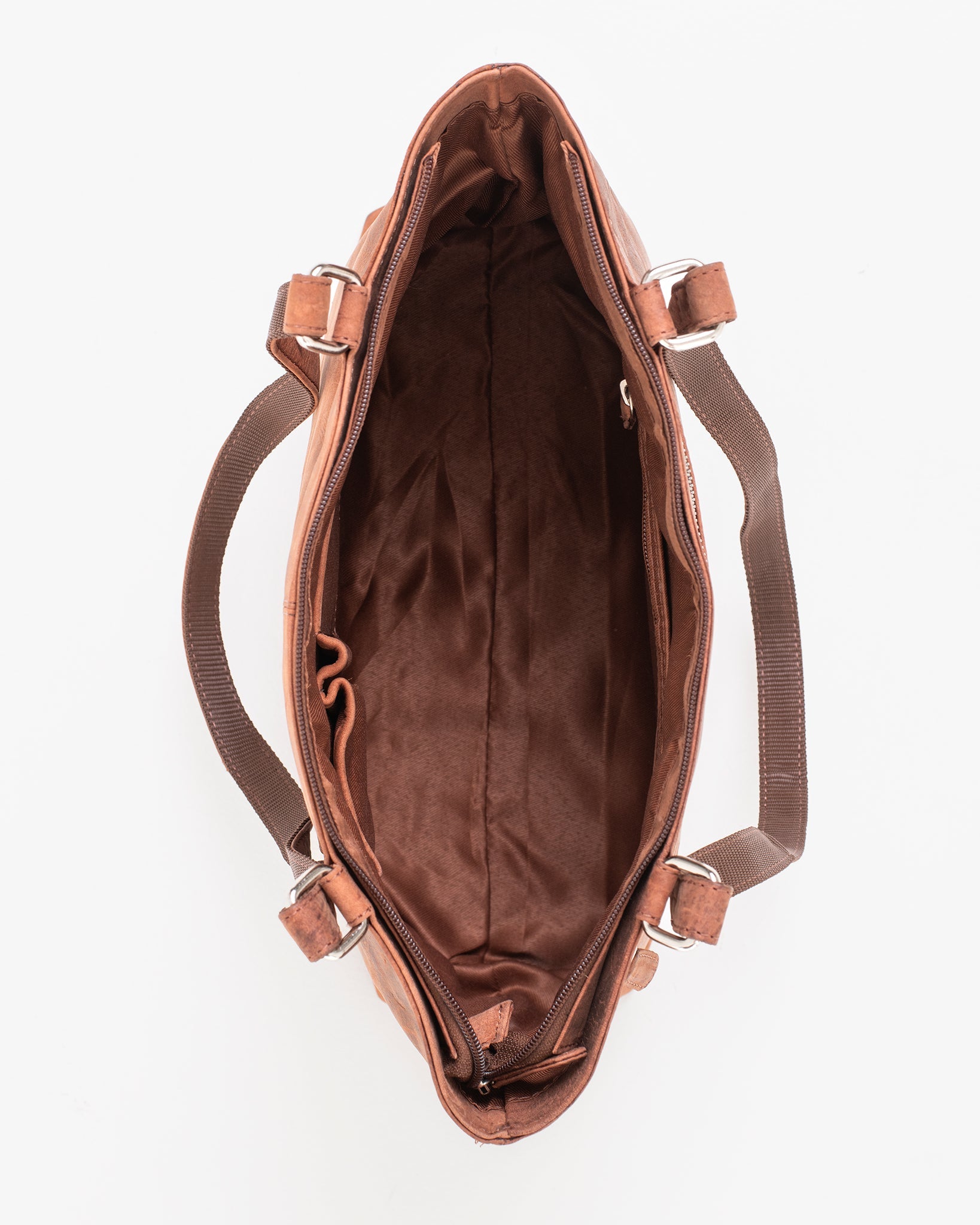 A brown leather shoulder bag with multiple zippered compartments, featuring a close-up of a buckle and detailed stitching. Dimensions: 40 x 26 x 11 cm. Made by Finnish brand Nabo.