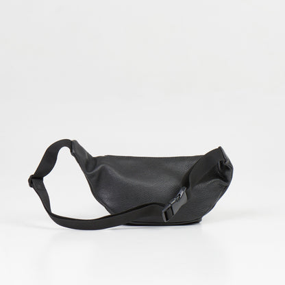 Black leather waist bag with adjustable strap, main and front zippered pockets, and back compartment. Handcrafted in Europe, measures 30 x 13 x 10 cm.