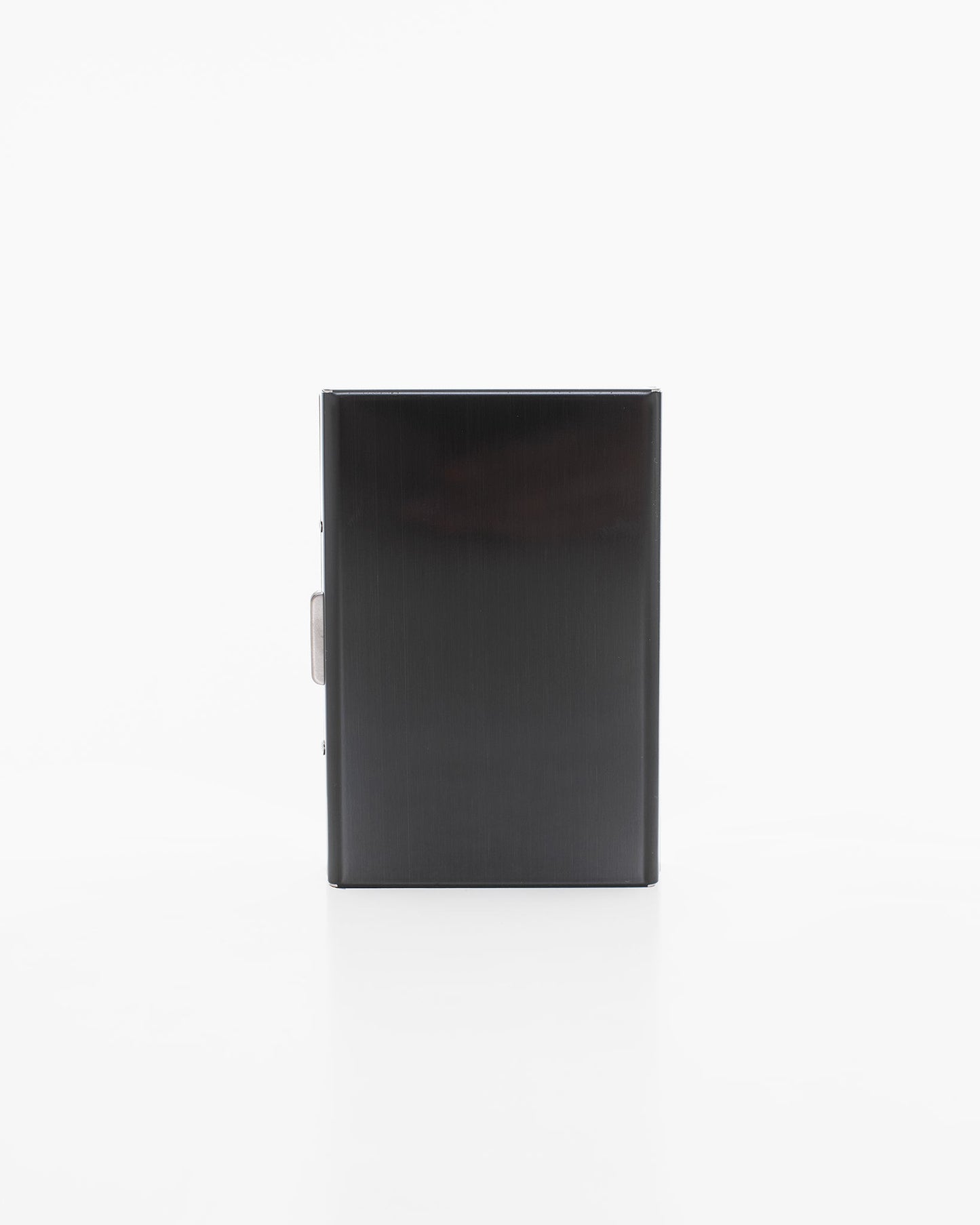 A sleek black metal card holder by Nabo, featuring 6 slots. Dimensions: 9.5 x 6.5 x 1.2 cm. Crafted by the Finnish brand known for quality bags.