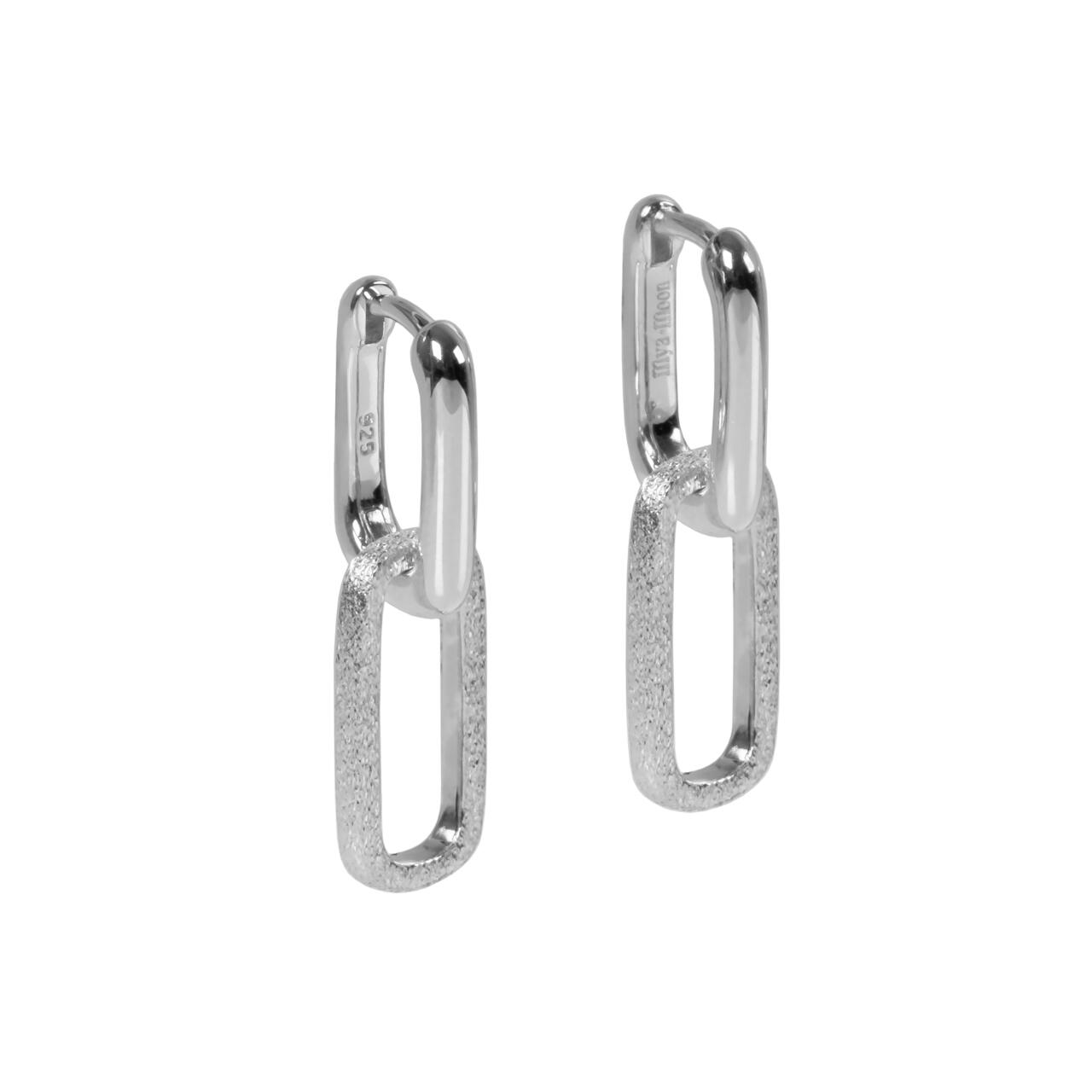 Metropolitan Earrings: A pair of 925 silver earrings showcasing clean, understated textures and luxurious accents, embodying city vibes with a timeless, smart-casual elegance.