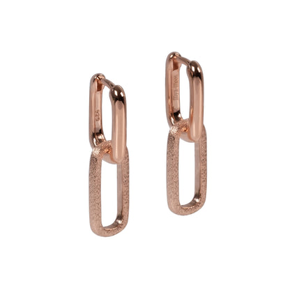 Metropolitan Earrings featuring gold plating and a sleek design, embodying city vibes with clean accents, inspired by understated luxury and smart-casual elegance.