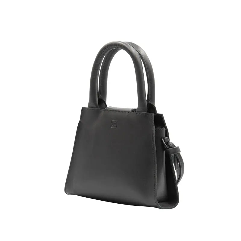 A sophisticated Mini Leather Handbag with reinforced handles, zipper closure, and detachable shoulder strap. Crafted from high-quality leather with knot detailing and logo embossing. Dimensions: 16x20x5 cm.