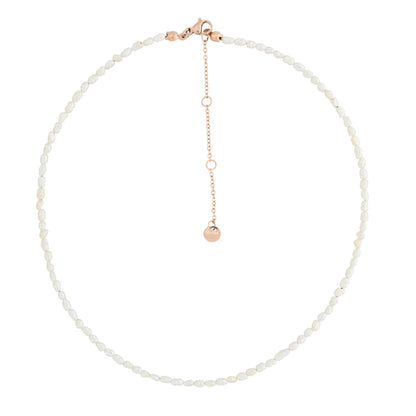 A close-up of a necklace with freshwater pearls and a gold chain, showcasing delicate pearls and durable stainless steel craftsmanship. Perfect for versatile styling and gifting. Length: 38 cm + 5 cm extension.