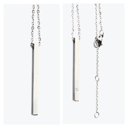 A silver bar necklace with a diamond pendant, showcasing a durable stainless steel construction. Length: 50 cm. Available in silver, rose gold, and gold.