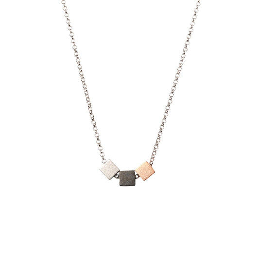 Satin Cube Choker Necklace featuring three square pendants on a 45 cm silver chain, designed for elegance and versatility by MyaMoon.