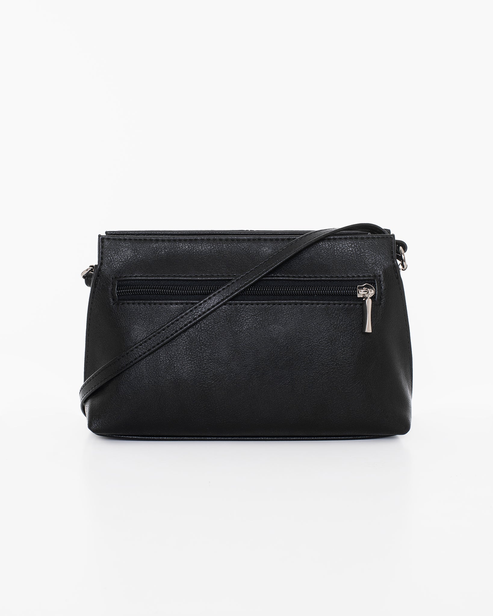 Small black leather shoulder bag by Nabo, featuring three zippered pockets and a 145 cm max strap size. Made in Finland. Dimensions: 23 x 14 x 7 cm.