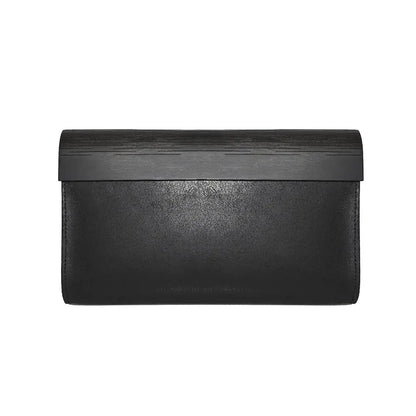 Handmade Glossy black Wood & Leather Clutch bag with detachable shoulder strap, showcasing sleek lines and unique birch wood panel. Magnetic clasp closure, interior zip pocket. Dimensions: H 14.5 cm, W 24 cm, D 4 cm.