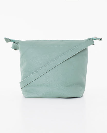 Handmade Suvi XS shoulder bag crafted from high-quality leather leftovers, uniquely designed in Estonia. Eco-friendly and durable. Size: 23 x 13 cm.